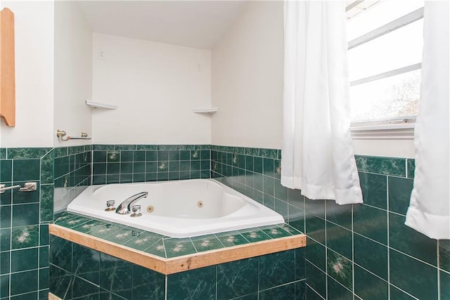 bathroom with tiled bath