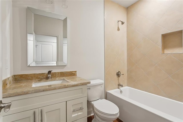 full bathroom featuring toilet, tub / shower combination, and vanity