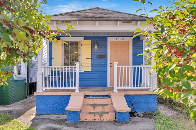 view of front of home featuring covered porch