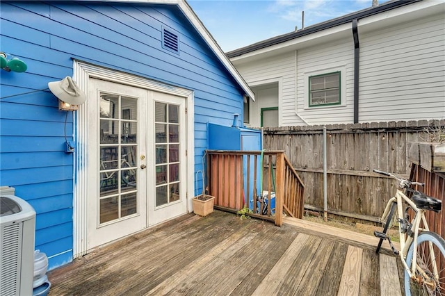 deck featuring french doors and central AC