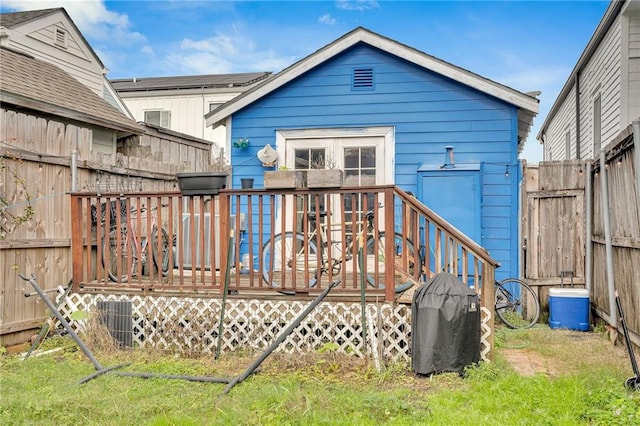 rear view of house with a deck