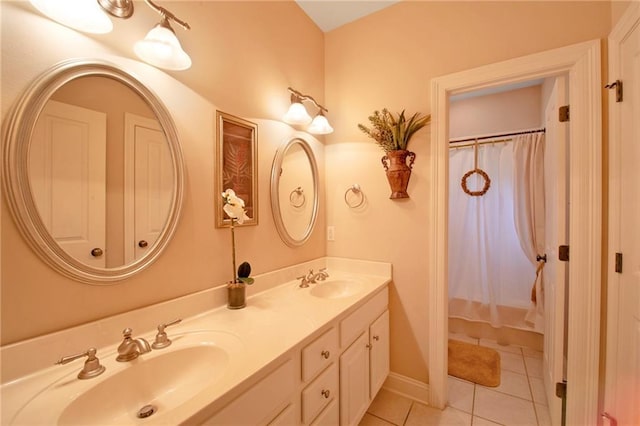 bathroom featuring tile patterned floors, a shower with shower curtain, and vanity