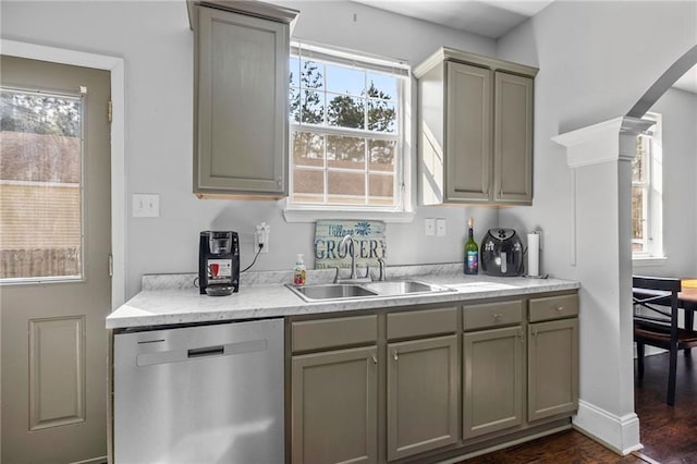 kitchen with sink, stainless steel dishwasher, dark wood-type flooring, and gray cabinetry