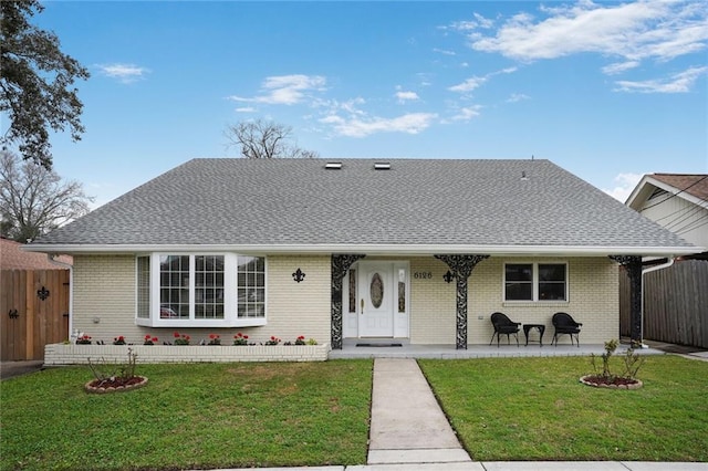 ranch-style home with a front yard