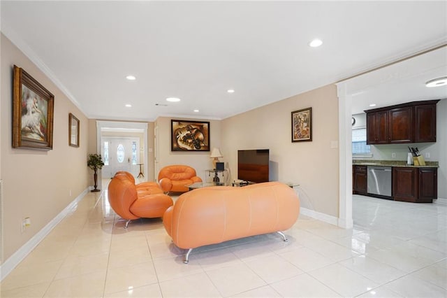 living area with light tile patterned floors, recessed lighting, baseboards, and ornamental molding