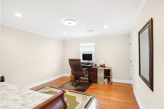 home office featuring hardwood / wood-style flooring and ornamental molding