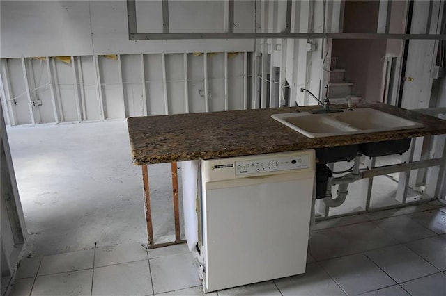 kitchen with dishwasher, sink, and light tile patterned floors