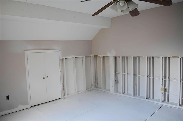 additional living space featuring ceiling fan and vaulted ceiling