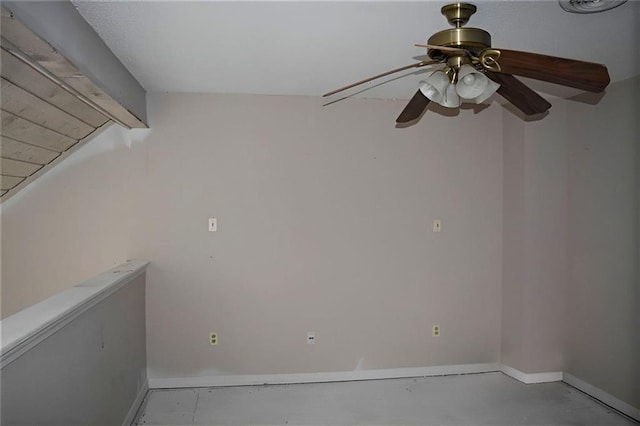 empty room with vaulted ceiling with beams and ceiling fan