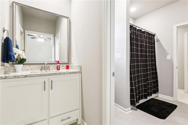 bathroom with vanity, a shower with curtain, tile patterned floors, and ceiling fan