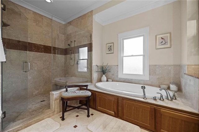 bathroom with plus walk in shower, ornamental molding, and tile patterned floors