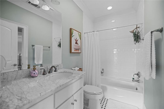 full bathroom featuring shower / bath combination with curtain, vanity, and toilet