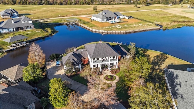 bird's eye view with a water view