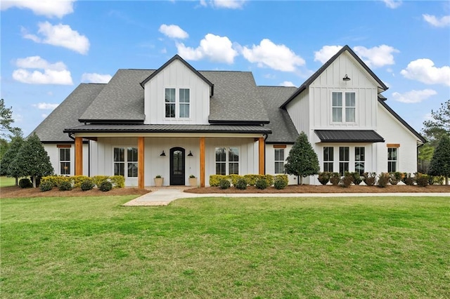 modern inspired farmhouse with a front yard