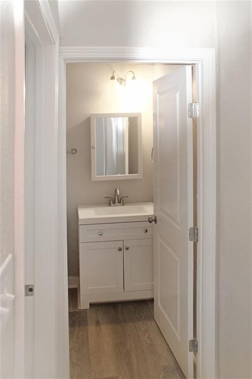 3533 S Liberty St, New Orleans, LA 70115 - bathroom with vanity and wood finished floors