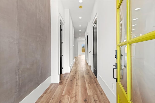 hall featuring light hardwood / wood-style floors