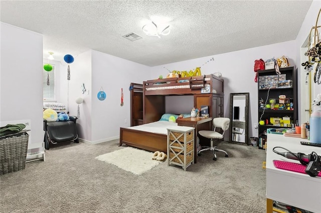 1125 Kingswood Dr, Westwego, LA 70094 - carpeted bedroom featuring visible vents and a textured ceiling