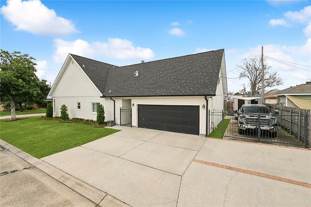 view of front facade featuring a garage and a front yard