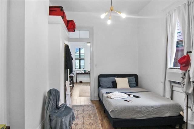 bedroom featuring dark wood-type flooring