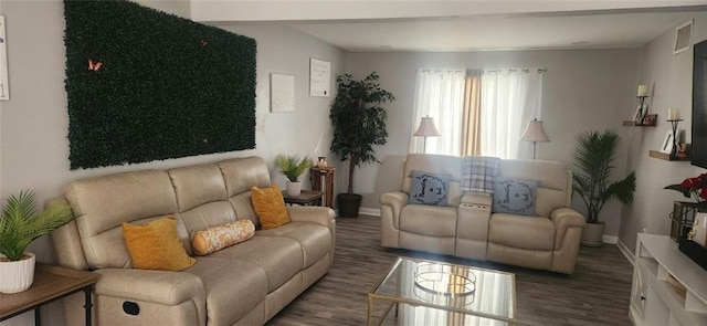 living room featuring dark wood-type flooring