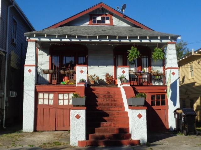 view of front of house featuring covered porch and roof with shingles