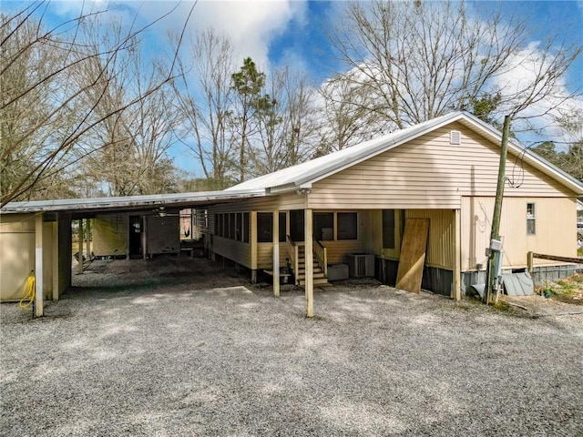 exterior space featuring a carport