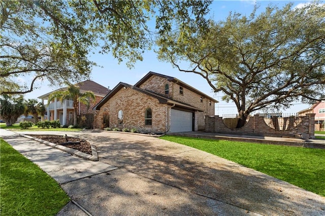 view of front facade featuring a garage and a front yard