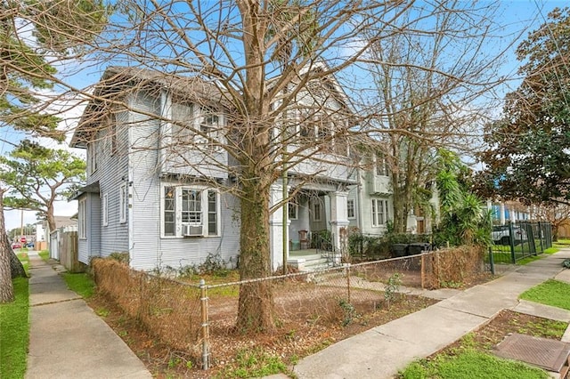 view of front of property with cooling unit