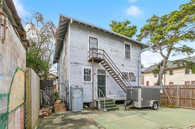 back of house featuring a patio