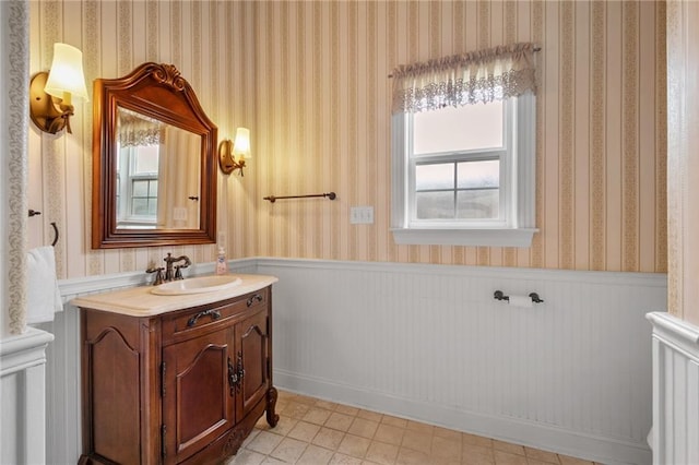 bathroom with vanity and a wealth of natural light