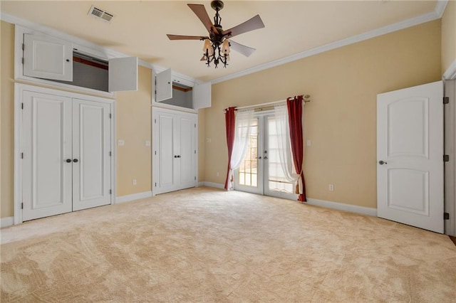 unfurnished bedroom with crown molding, ceiling fan, access to exterior, light carpet, and french doors