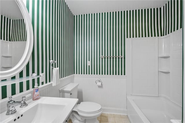 full bathroom featuring tile patterned flooring, sink, toilet, and shower / bath combination