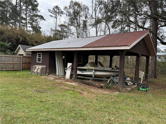 view of outdoor structure with fence