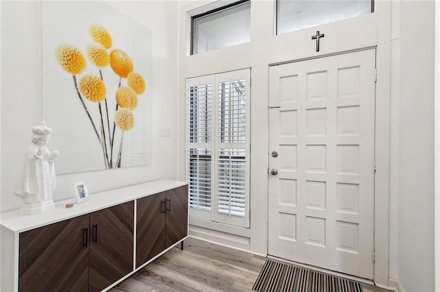 entrance foyer with light hardwood / wood-style flooring