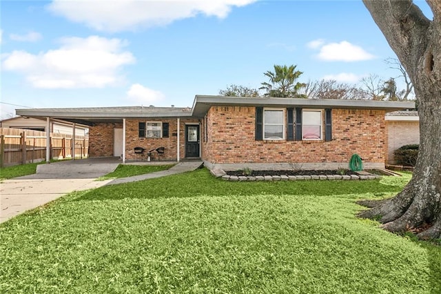 ranch-style house with a carport and a front lawn