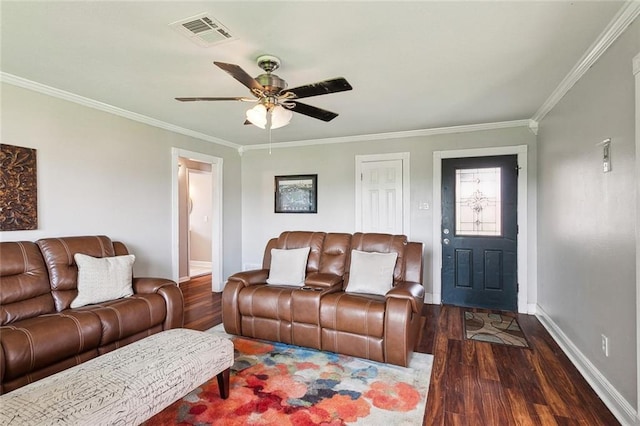 living room featuring crown molding, dark hardwood / wood-style floors, and ceiling fan