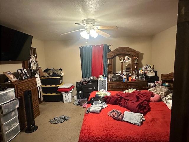 bedroom featuring carpet floors and ceiling fan