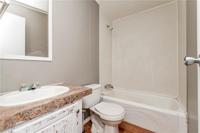 full bathroom featuring shower / tub combination, vanity, and toilet