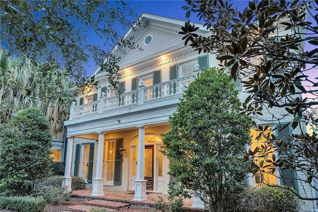 2809 Prytania St, New Orleans, LA 70115 - view of front facade featuring a balcony and covered porch