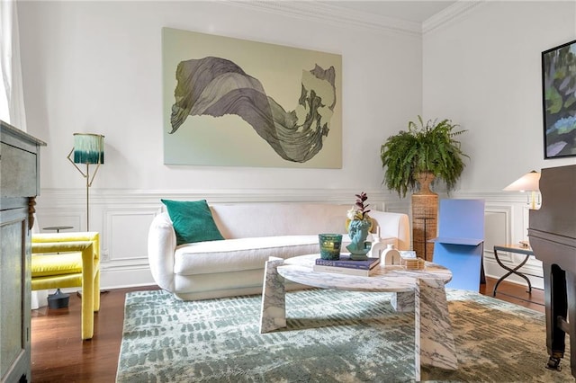 2809 Prytania St, New Orleans, LA 70115 - living room with a fireplace, crown molding, wood finished floors, wainscoting, and a decorative wall