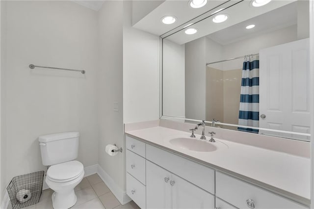 2809 Prytania St, New Orleans, LA 70115 - full bath with toilet, tile patterned floors, baseboards, vanity, and recessed lighting