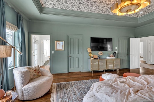 2809 Prytania St, New Orleans, LA 70115 - bedroom featuring a tray ceiling, ornamental molding, wood finished floors, and a chandelier