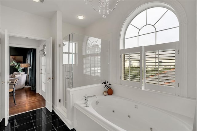 2809 Prytania St, New Orleans, LA 70115 - full bath featuring tile patterned floors, double vanity, a chandelier, and baseboards