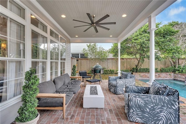 2809 Prytania St, New Orleans, LA 70115 - view of patio with an outdoor hangout area, a fenced backyard, and ceiling fan