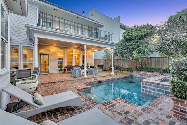 2809 Prytania St, New Orleans, LA 70115 - view of pool featuring a fenced backyard, a patio, and an in-ground hot tub