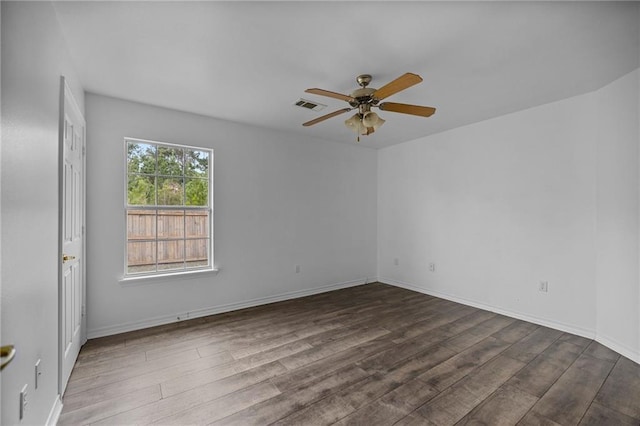 unfurnished room featuring hardwood / wood-style flooring and ceiling fan