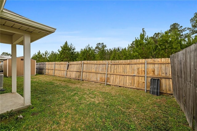 view of yard with a storage shed