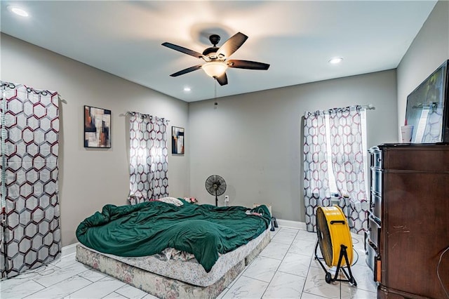 bedroom featuring ceiling fan