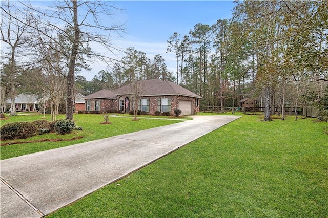 ranch-style home with a garage and a front yard