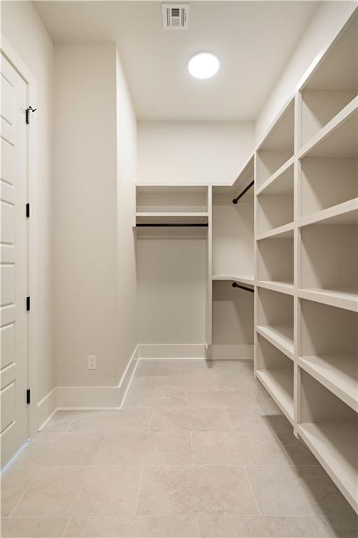 walk in closet featuring visible vents